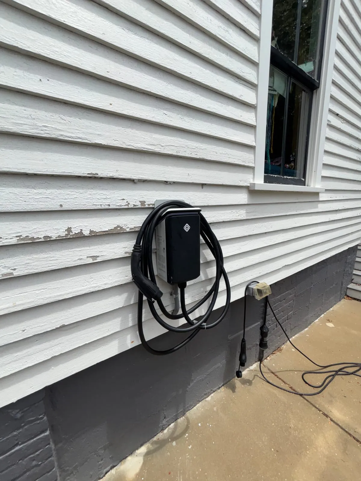 Outdoor EV charger on a dedicated 60-amp circuit